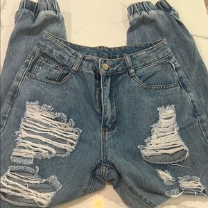 Distressed Blue Denim Jeans
